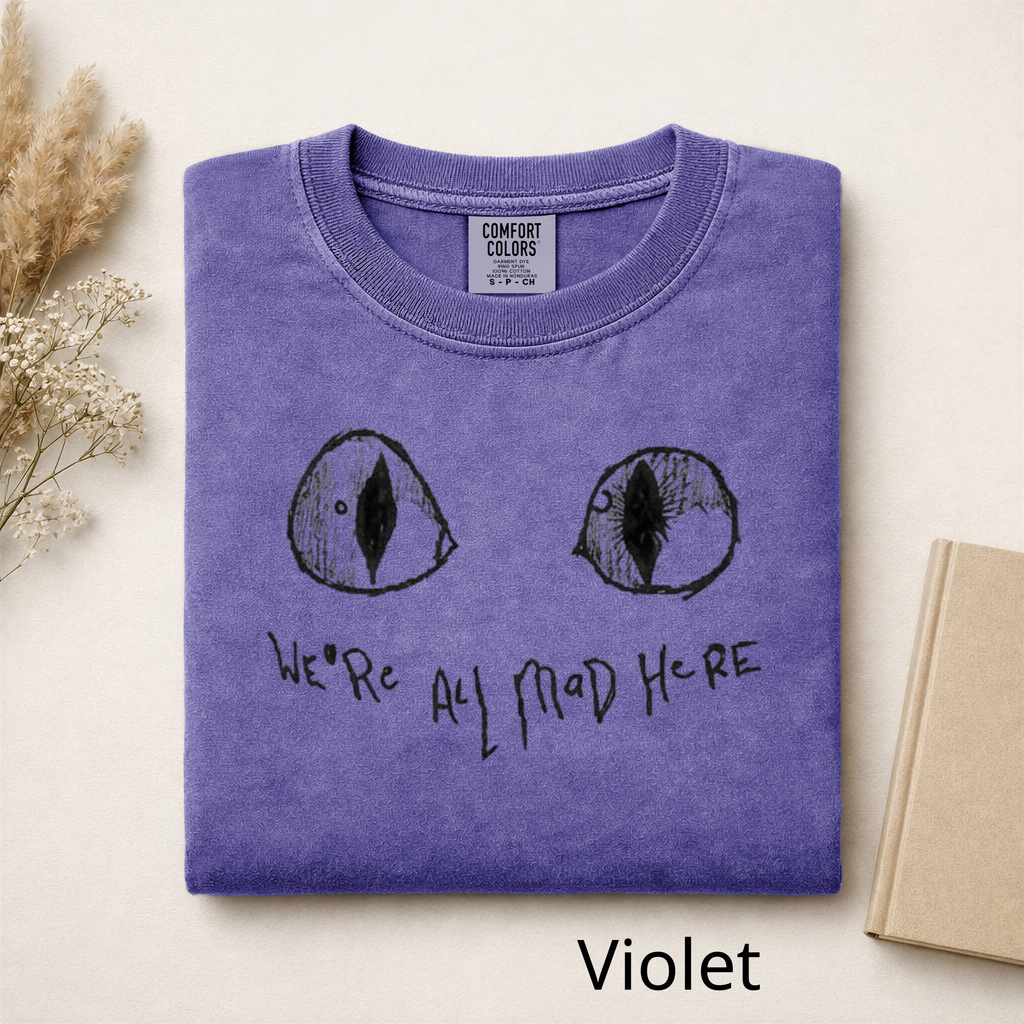 We're All Mad Here Cat Eyes T-Shirt, Alice in Wonderland Inspired Graphic Tee, Cheshire Cat Aesthetic Shirt, Book Lover Gift