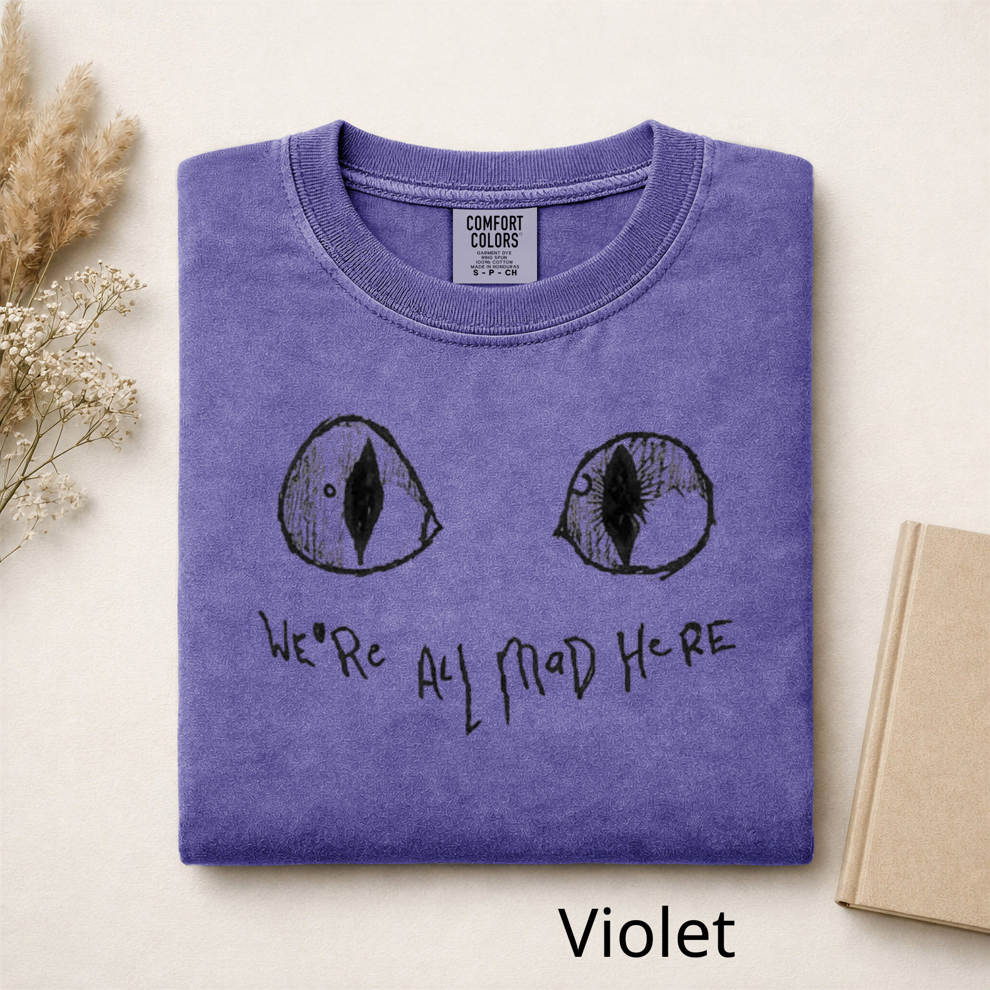 We're All Mad Here Cat Eyes T-Shirt, Alice in Wonderland Inspired Graphic Tee, Cheshire Cat Aesthetic Shirt, Book Lover Gift